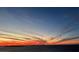 Expansive sunset view over the ocean displaying stunning colors and cloud formations at 35 Watergate Dr # 1103, Sarasota, FL 34236