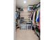 Spacious walk-in closet featuring organized shelving and ample storage space at 3664 Lake Bayshore Dr # K323, Bradenton, FL 34205