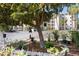 Well-maintained landscaping and flowerbeds near resident parking at 3664 Lake Bayshore Dr # K323, Bradenton, FL 34205