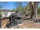 Outdoor grill under a protective cover, available for tenants at 3664 Lake Bayshore Dr # K323, Bradenton, FL 34205