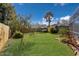 Lush backyard with a well-maintained lawn and mature landscaping at 3809 21St W Ave, Bradenton, FL 34205