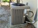 Modern air conditioning unit, ensuring efficient climate control for year-round comfort at 3818 Sun Eagle Ln, Bradenton, FL 34210
