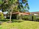 Private backyard with fenced yard and mature trees at 3818 Sun Eagle Ln, Bradenton, FL 34210