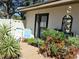 Backyard features privacy fence, stone, and mature landscaping at 3818 Sun Eagle Ln, Bradenton, FL 34210