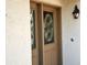 Up close view of double front door with decorative glass panels at 3818 Sun Eagle Ln, Bradenton, FL 34210