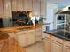 Kitchen with granite counters, mirrored backsplash and stainless steel appliances at 3818 Sun Eagle Ln, Bradenton, FL 34210