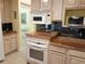 Well-equipped kitchen with granite countertops and modern appliances at 3818 Sun Eagle Ln, Bradenton, FL 34210