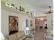 Bright living room with sofa, art, and clerestory with decor at 3818 Sun Eagle Ln, Bradenton, FL 34210