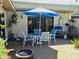 Nice outdoor patio with fire pit, patio furniture, and grill at 3818 Sun Eagle Ln, Bradenton, FL 34210