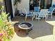 Outdoor patio features fire pit, patio furniture, and privacy at 3818 Sun Eagle Ln, Bradenton, FL 34210
