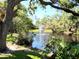 Picturesque pond with a fountain, enhancing the property's tranquility and aesthetic appeal at 3818 Sun Eagle Ln, Bradenton, FL 34210