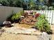 Landscaped outdoor water feature adds a serene and attractive element to the property at 3818 Sun Eagle Ln, Bradenton, FL 34210