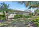 Well maintained single Gathering home with groomed hedges and mature shade trees at 3880 Wilshire Cir # 28, Sarasota, FL 34238