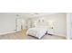Spacious main bedroom with wood floors, sitting area and ensuite bath at 3880 Wilshire Cir # 28, Sarasota, FL 34238