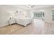 Spacious main bedroom with wood floors, sitting area and ensuite bath at 3880 Wilshire Cir # 28, Sarasota, FL 34238