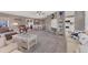 Spacious living room with open layout, adjacent dining area, and modern decor at 4304 14Th E St, Ellenton, FL 34222