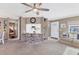 Open-concept living room featuring a breakfast bar area with seating and a cozy, inviting atmosphere at 4304 14Th E St, Ellenton, FL 34222