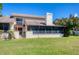The backyard features an enclosed patio and gate to the golf course at 4532 La Jolla Dr, Bradenton, FL 34210