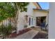 Charming front porch with comfortable seating, landscaping, and inviting entrance at 4532 La Jolla Dr, Bradenton, FL 34210