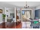 Open-concept living area with view of the office and screened porch at 4532 La Jolla Dr, Bradenton, FL 34210