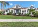 Charming exterior with well-manicured lawn and tasteful landscaping at 4620 Blue Marlin Dr, Bradenton, FL 34208