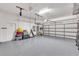 Spacious garage with grey flooring and white walls and door at 4620 Blue Marlin Dr, Bradenton, FL 34208
