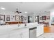 Bright, open-concept kitchen with a breakfast bar, stainless steel appliances, and a seamless connection to the living area at 4620 Blue Marlin Dr, Bradenton, FL 34208