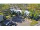 Expansive aerial view of condo community showcasing well-maintained buildings, landscaping, and ample parking at 4906 25Th W St # 106, Bradenton, FL 34207