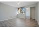 A spacious bedroom with a mirrored closet and a large window providing ample natural light to the space at 4906 25Th W St # 106, Bradenton, FL 34207