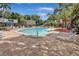 A clear view of the community pool and lounge chairs, perfect for relaxing and socializing at 4906 25Th W St # 106, Bradenton, FL 34207