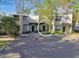 Inviting two-story condo with assigned parking and landscaping offering a blend of comfort and convenience at 4906 25Th W St # 106, Bradenton, FL 34207