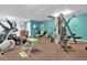 Onsite fitness center with ample workout equipment, including a weight machine and elliptical at 4906 25Th W St # 106, Bradenton, FL 34207