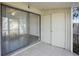 This patio features both sliding glass door access and a door to a storage area at 4906 25Th W St # 106, Bradenton, FL 34207