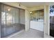 This patio features both sliding glass door access and a door to a laundry room at 4906 25Th W St # 106, Bradenton, FL 34207
