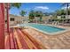 An inviting community pool area with plenty of seating, ideal for warm days at 4906 25Th W St # 106, Bradenton, FL 34207