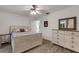 Bedroom featuring light wood floors and neutral decor at 5019 Village Gardens Dr # 31, Sarasota, FL 34234