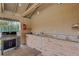 Convenient outdoor kitchen space featuring a built-in grill, sink, and counter at 5019 Village Gardens Dr # 31, Sarasota, FL 34234