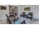 Airy sunroom offers wicker seating, natural light, and easy access to other areas of the home, perfect for relaxation at 5019 Village Gardens Dr # 31, Sarasota, FL 34234