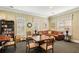 Inviting community lounge featuring comfortable seating, a library, and ample natural light at 5630 Simonton St, Bradenton, FL 34203