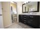 Bathroom with a view from the vanity into the water closet at 7431 Dickens Dr, Sarasota, FL 34231