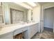 Bathroom showcasing a white vanity, countertop, and ample storage space at 7431 Dickens Dr, Sarasota, FL 34231