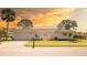 Attractive single-story home with a well-kept lawn and a spacious driveway at 7431 Dickens Dr, Sarasota, FL 34231