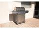 Stainless steel grill on a brick patio is ready for backyard barbecues at 7431 Dickens Dr, Sarasota, FL 34231