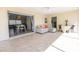 Sunlit lanai with cozy seating area, perfect for relaxation and entertaining guests at 7431 Dickens Dr, Sarasota, FL 34231