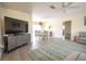 Bright living room featuring sleek flooring, a modern TV stand, and an open layout at 7431 Dickens Dr, Sarasota, FL 34231