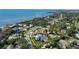 Aerial view shows property's location near the water and surrounding neighborhood at 7715 Westmoreland Dr, Sarasota, FL 34243