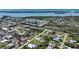 Panoramic aerial view of a coastal community with homes and waterways in Florida at 8219 Drew St, Englewood, FL 34224