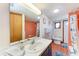 Bathroom featuring a large mirror and a vanity with a sink at 8270 Manasota Key Rd, Englewood, FL 34223