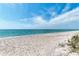 Expansive view of the beach with crystal clear ocean waters and blue skies at 8270 Manasota Key Rd, Englewood, FL 34223