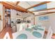 Dining area opens to the kitchen and features a skylight at 8270 Manasota Key Rd, Englewood, FL 34223